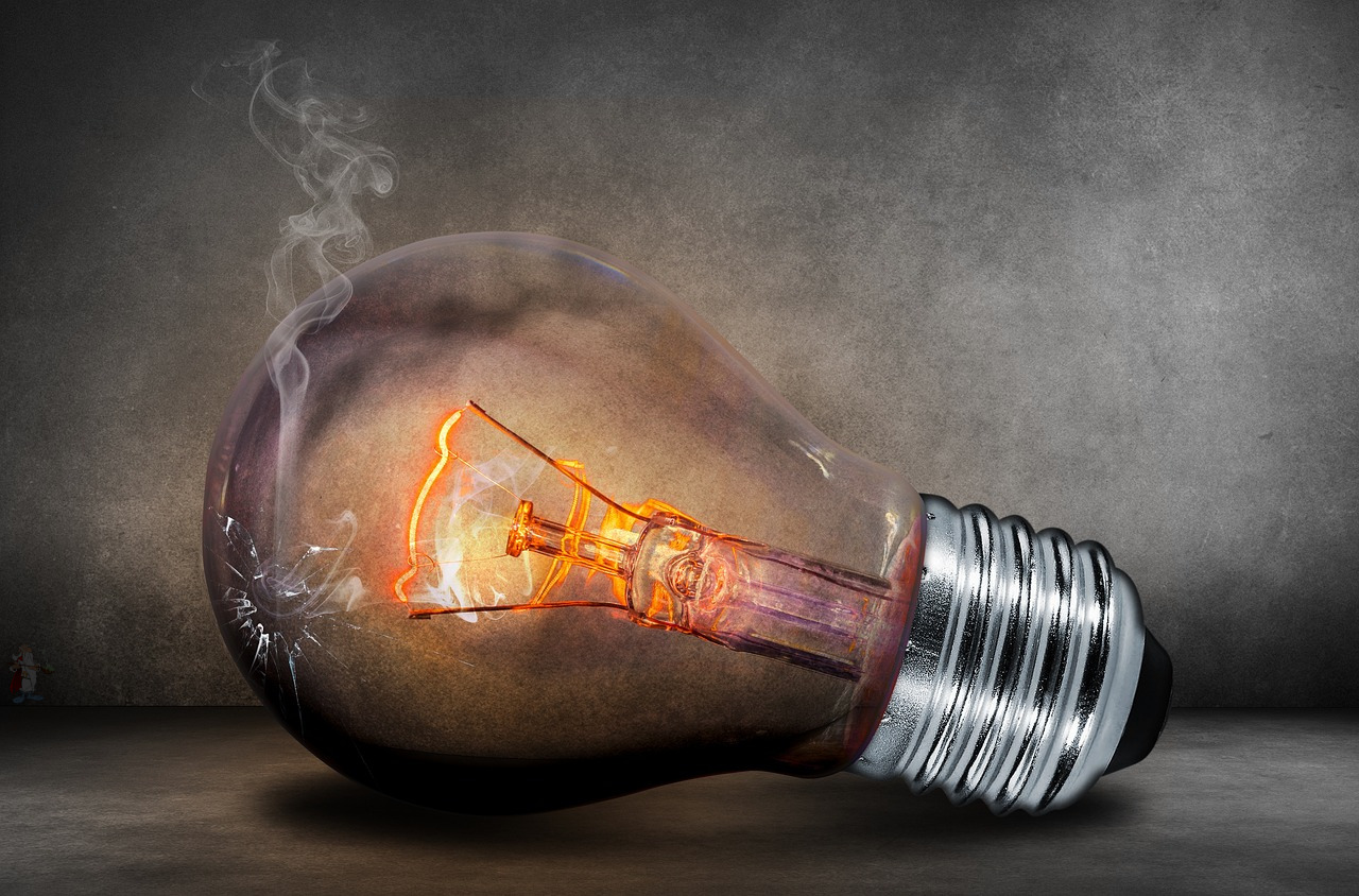 smoking incandescent light bulb